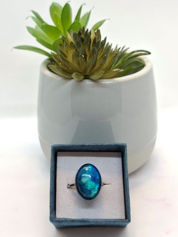 oval blue ring
