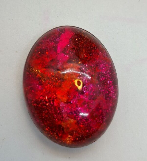 pink oval brooch